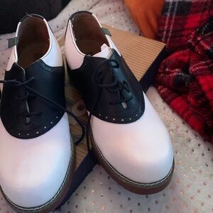 Black and white school shoes